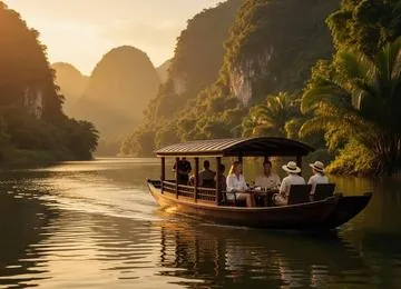 Guests on a wooden boat gliding along a jungle river